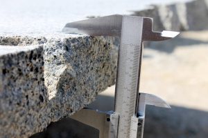 Fired granite Slabs being measured