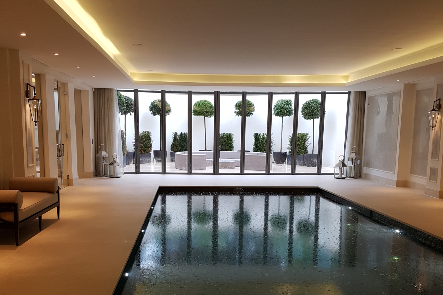 Swimming Pool with Absolute Crema Marfil Surround – Kinorigo