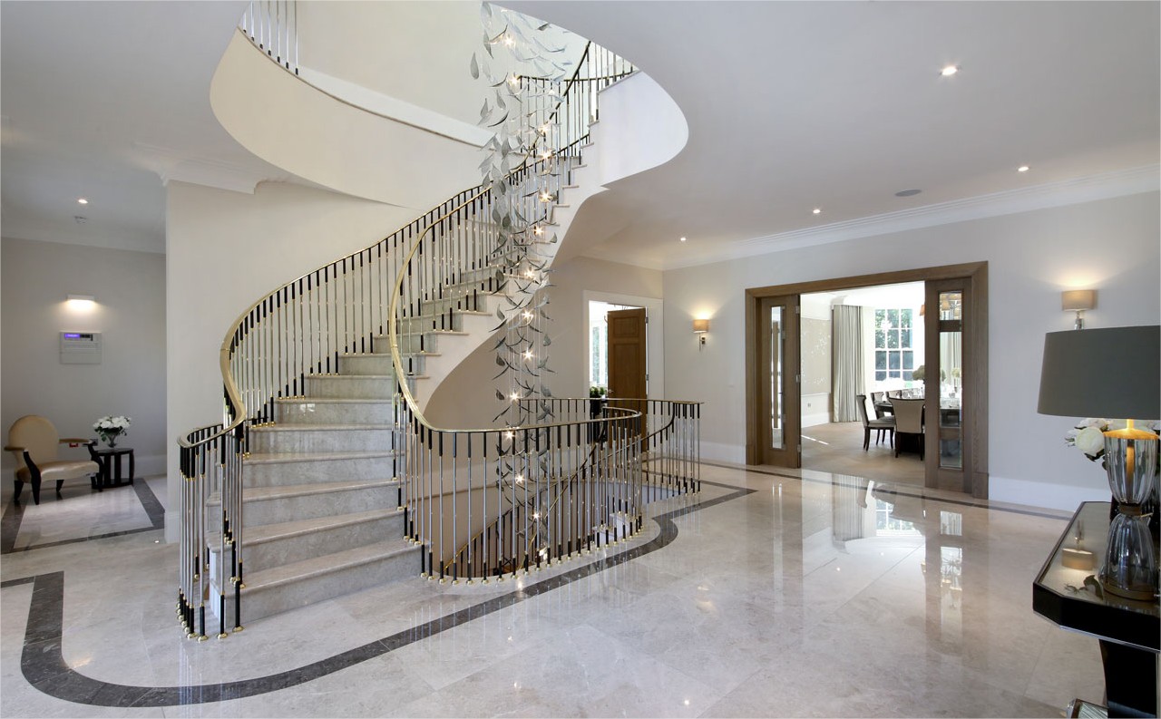 marble spiral staircase with light feature