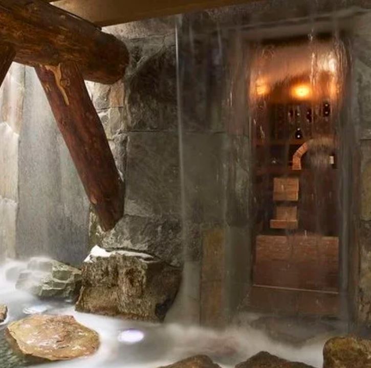 wet room inside cave with waterfall